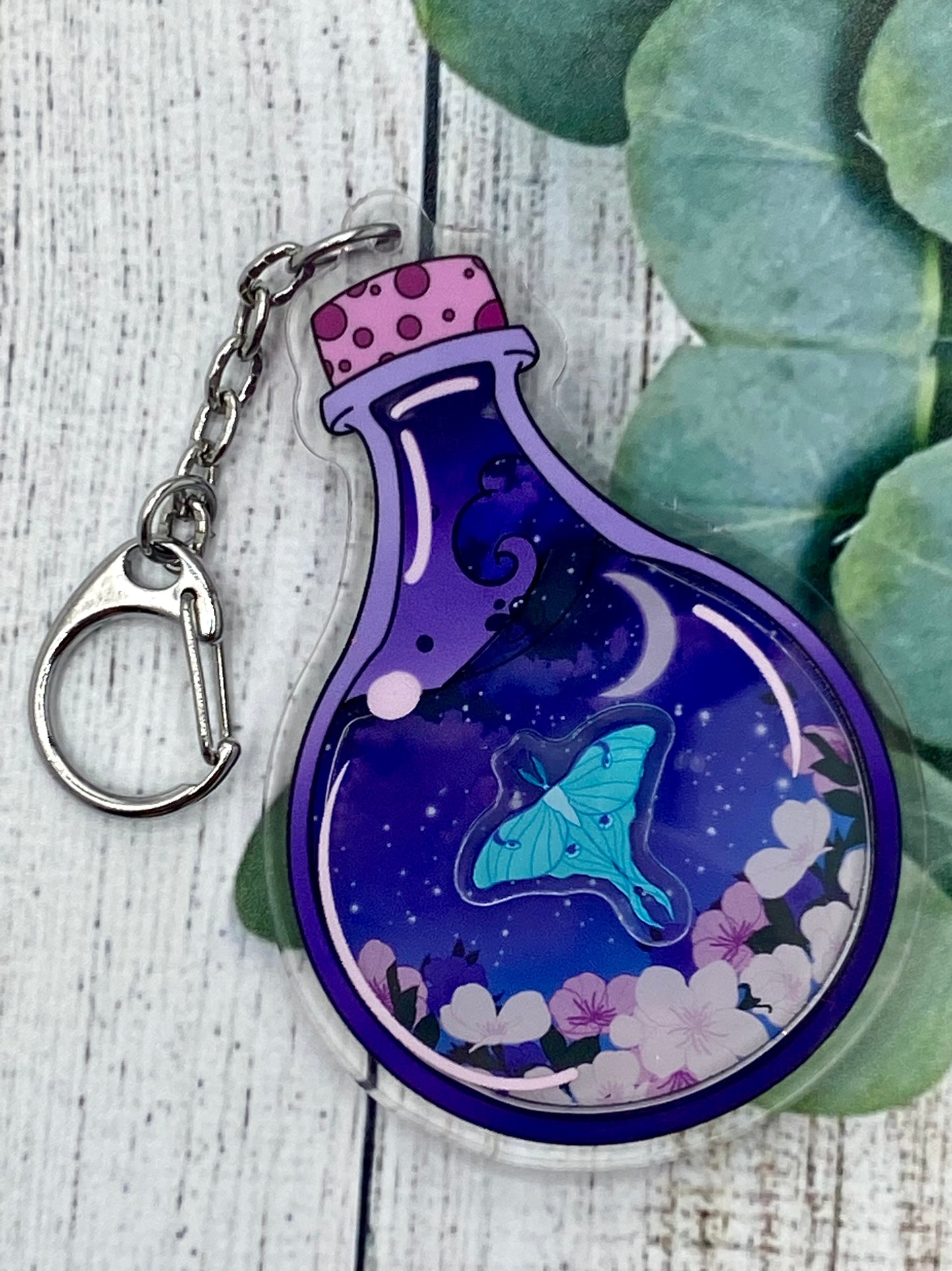 Luna moth potion shaker keychain
