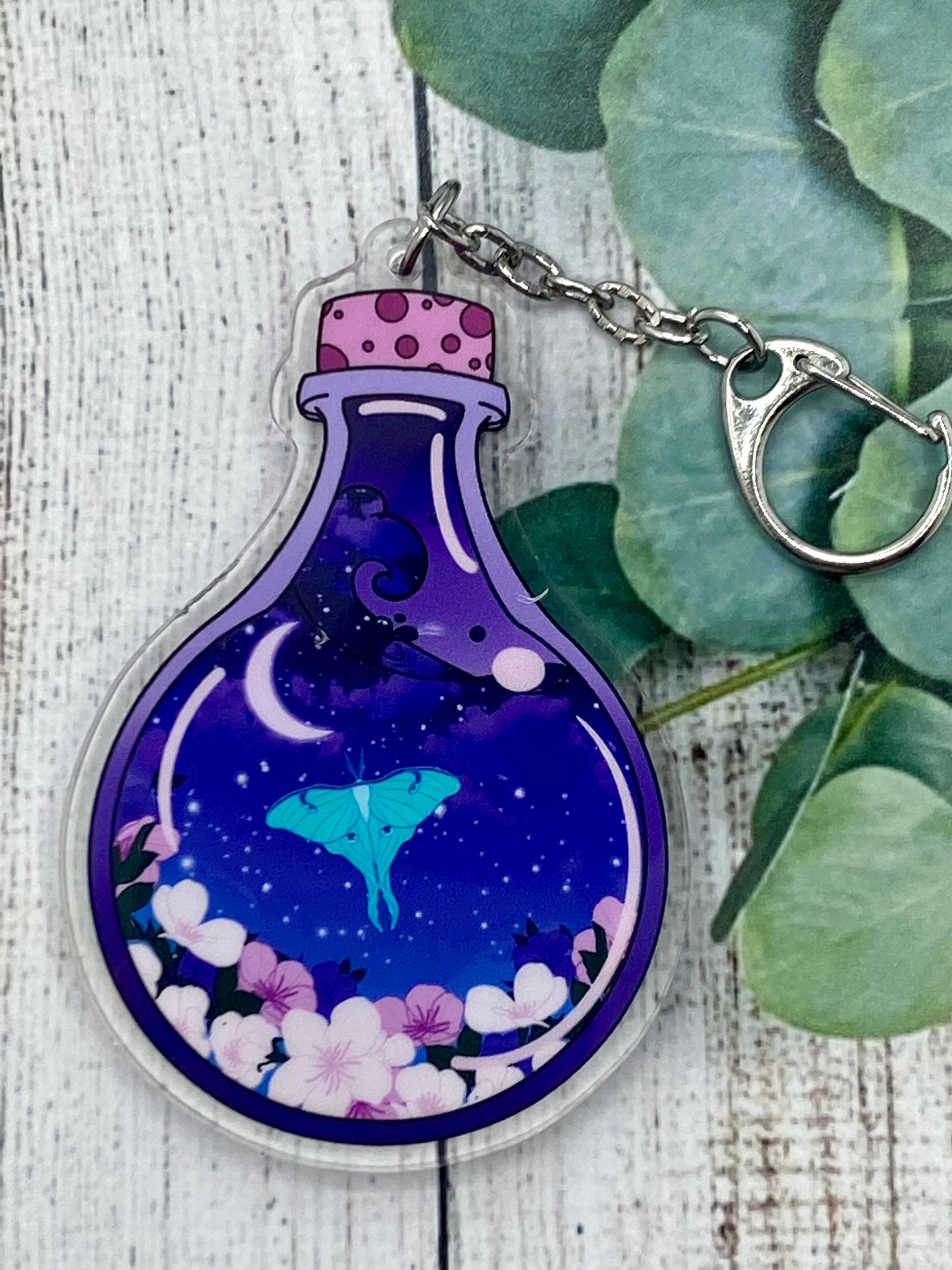 Luna moth potion shaker keychain