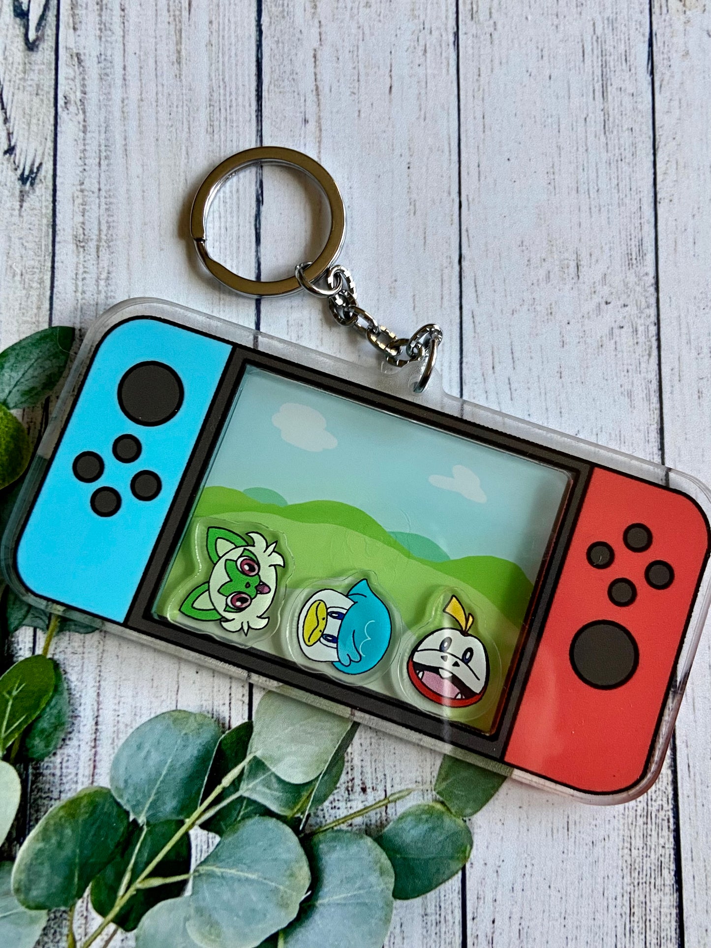 Game console, keychain with pocket monsters