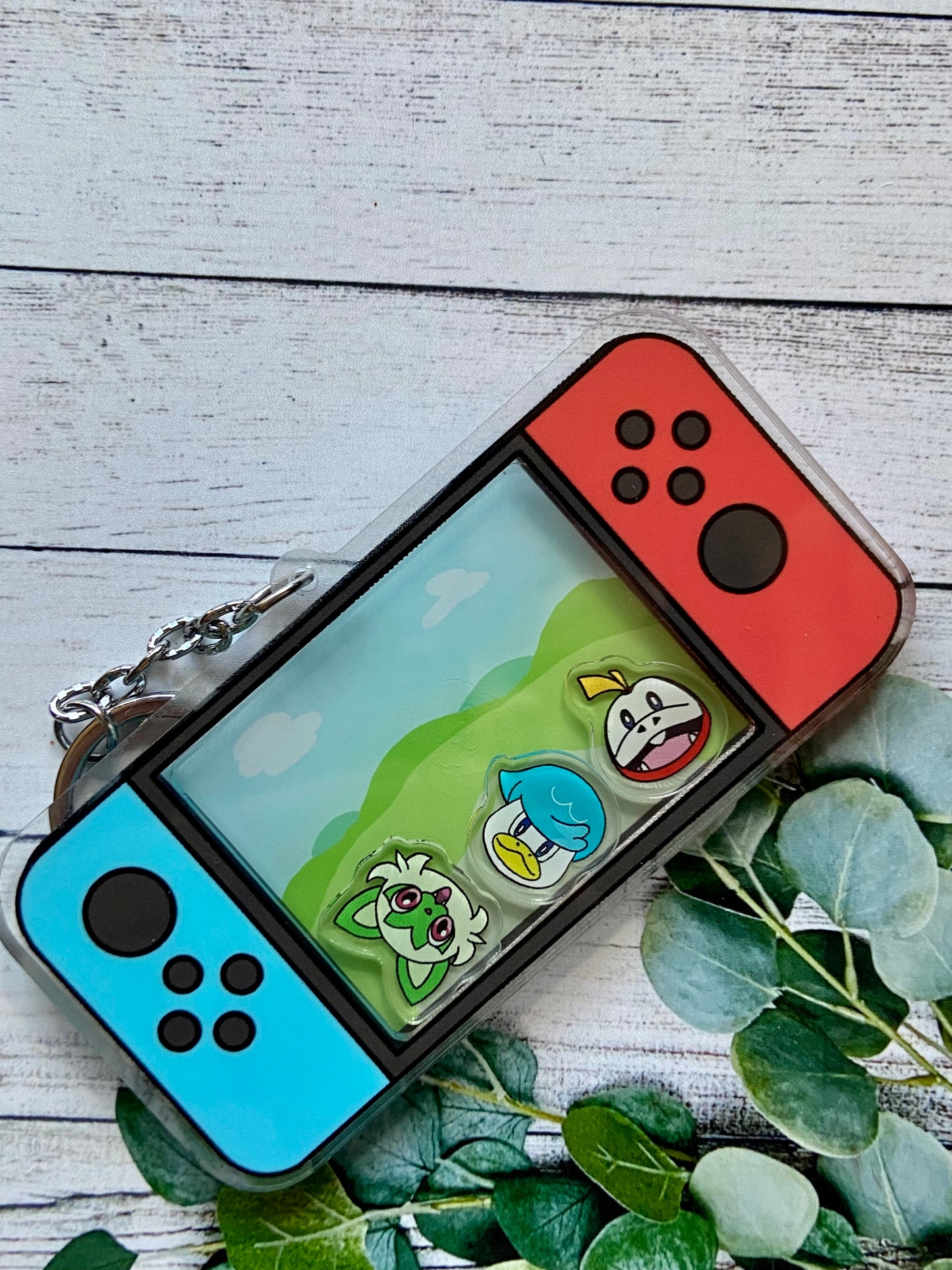 Game console, keychain with pocket monsters